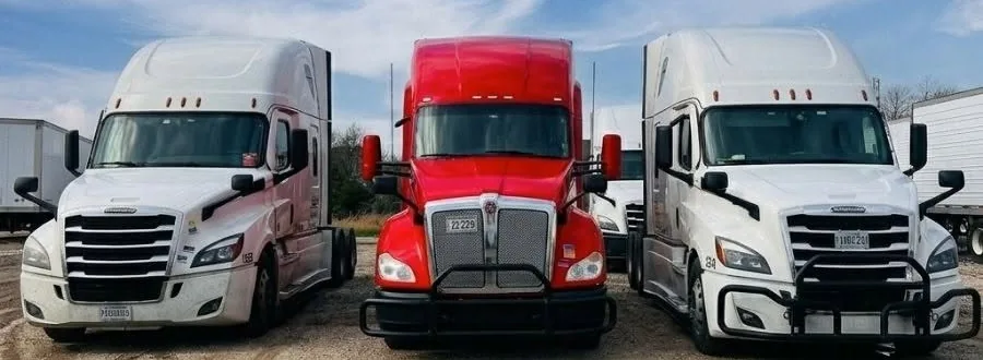 Kenworth and Freightliner tractors at the ASAP Trans Corp Lemont terminal